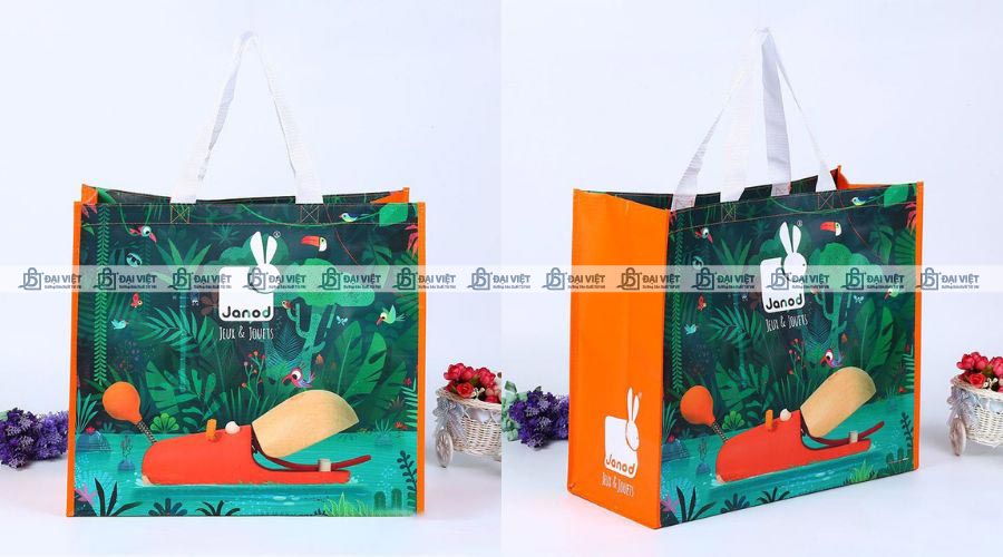 In hình lên túi vải không dệt cán màng bằng trục đồng
